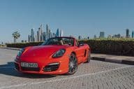 Red Porsche Boxster parked on Palm Jumeirah