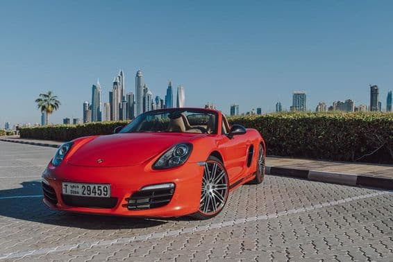 Red Porsche Boxster parked on Palm Jumeirah