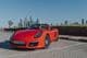 Red Porsche Boxster parked on Palm Jumeirah