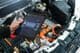 Checking an electric car battery at a service center