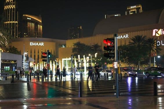 Pedestrians in downtown at night