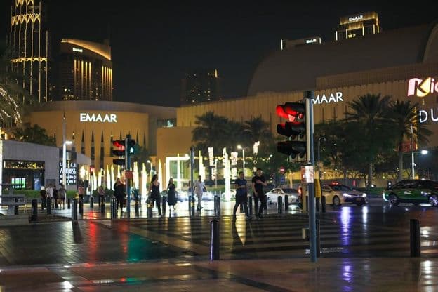 Pedestrians in downtown at night