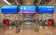 departure sign at Dubai International Airport