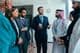 Multinational businesspeople standing in an office